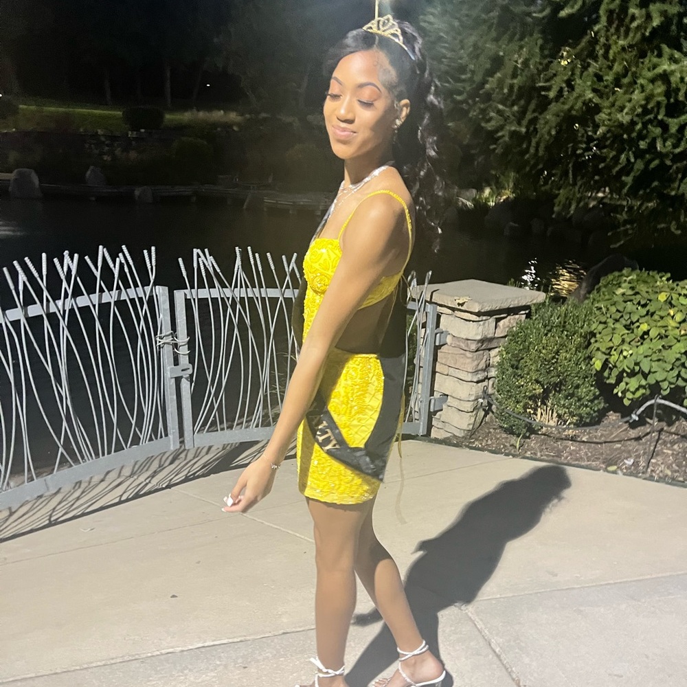 Yellow Homecoming dress with rhinestones from Gipper Prom.